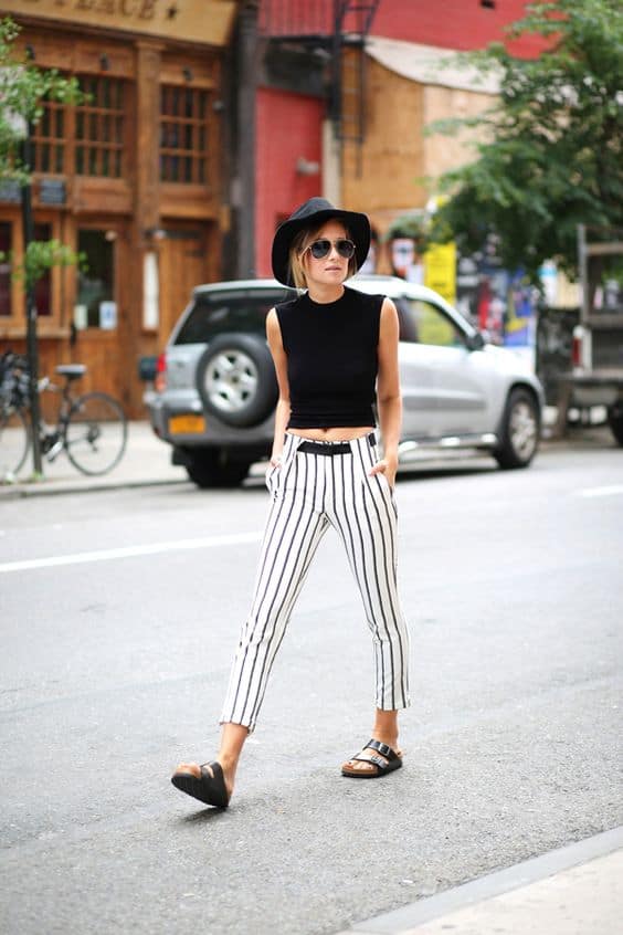 black and white striped pants with fedora hat