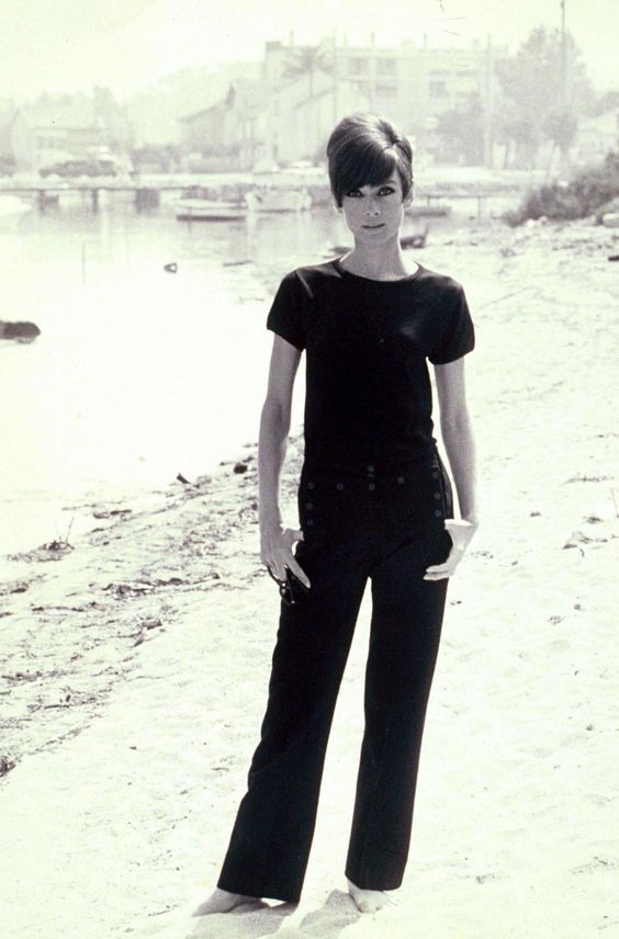 Audry Hepburn in black tee and jeans