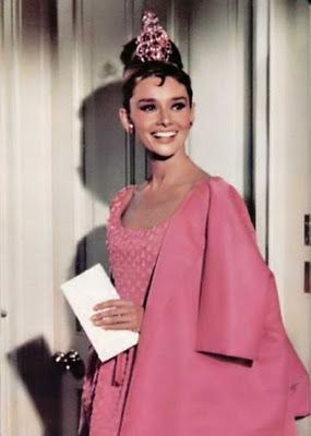 Audry Hepburn in pink coat in “Breakfast…”