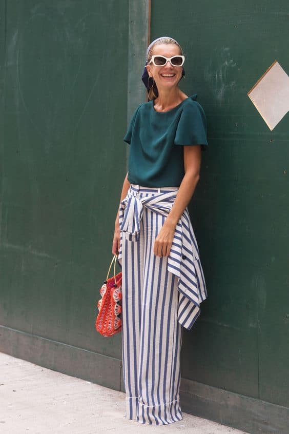 striped pants with teal green blouse