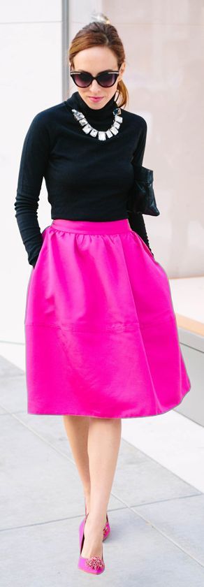 Magenta midi skirt with silver necklace and black top