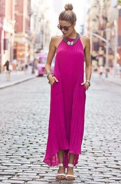 Magenta maxi dress with golden necklace and white sandals