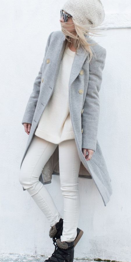 Light gray trench coat with white beanie and black boots