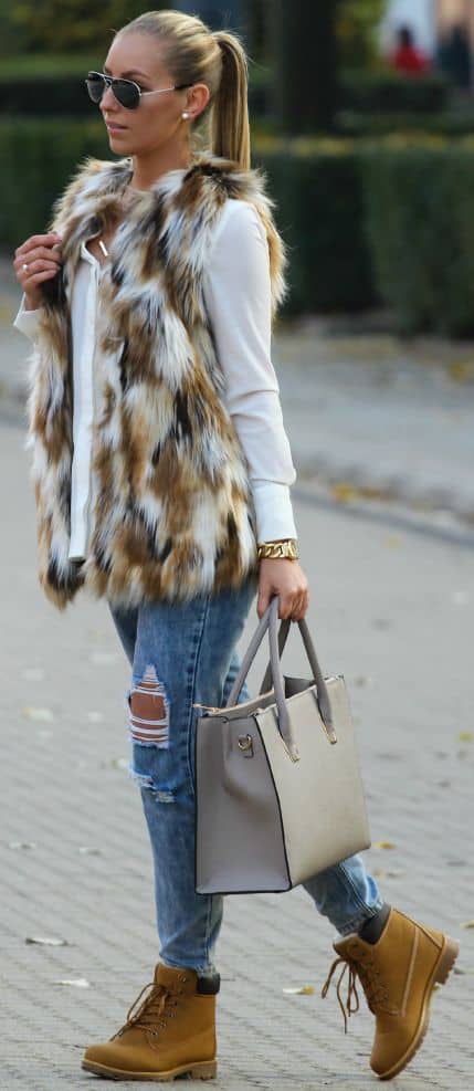 outfit with fur vest and classic timbalands