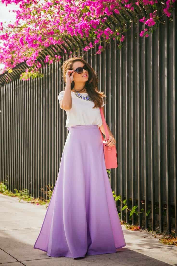 Lavender maxi skirt with lavender necklace and salmon bag