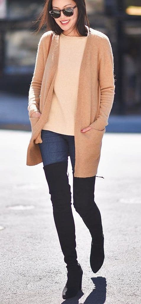 Light brown cardigan with black over-the-knee-boots