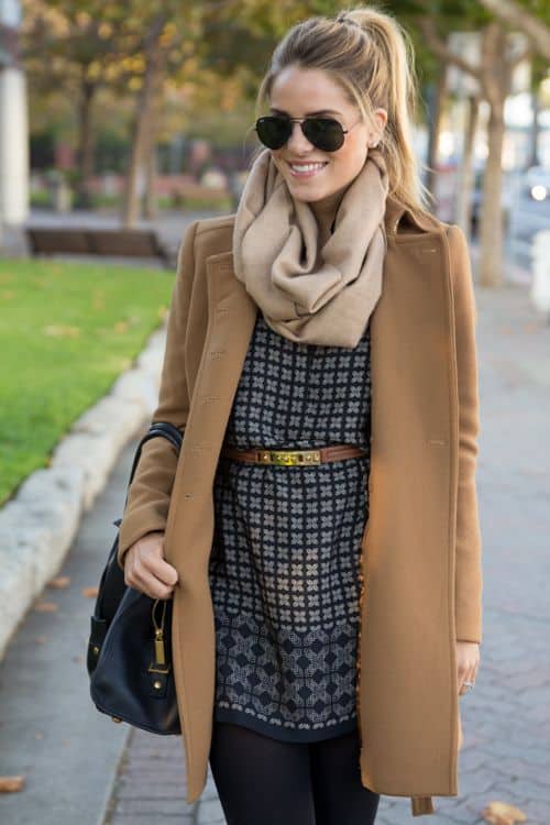 Light brown coat with beige scarf and graphic dress
