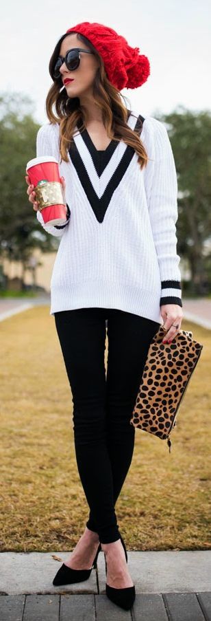 outfit with red beanie and leopard clutch