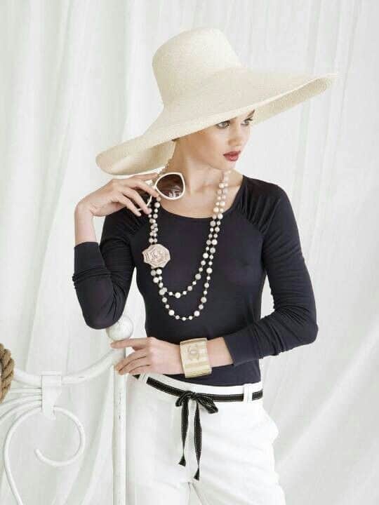 white broad brimmed hat in Coco Chanel style