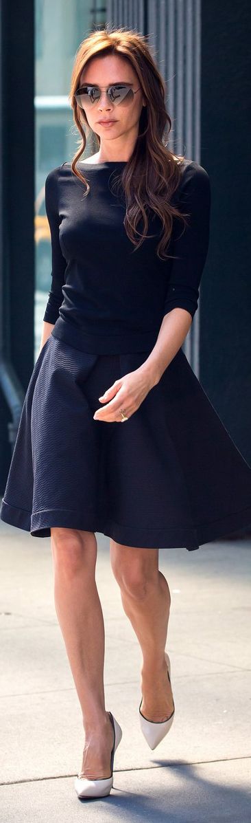 Victoria Beckham in black scater skirt