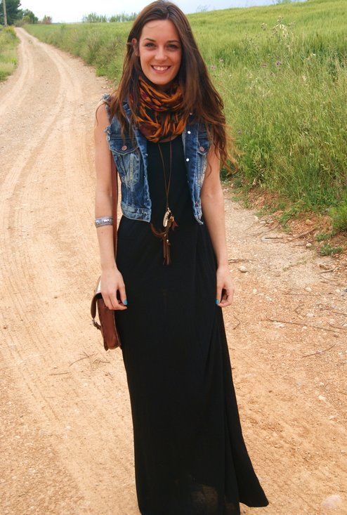 outfit with denim vest and black maxi dress
