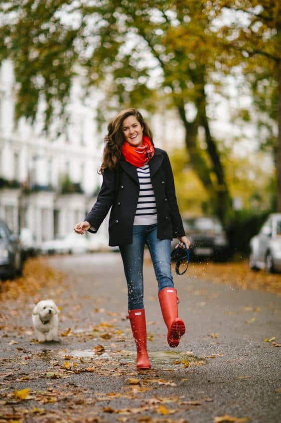 outfit with red rain boots and black coat
