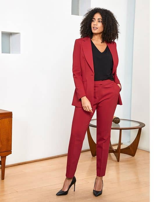 woman wear cherry red suit black top